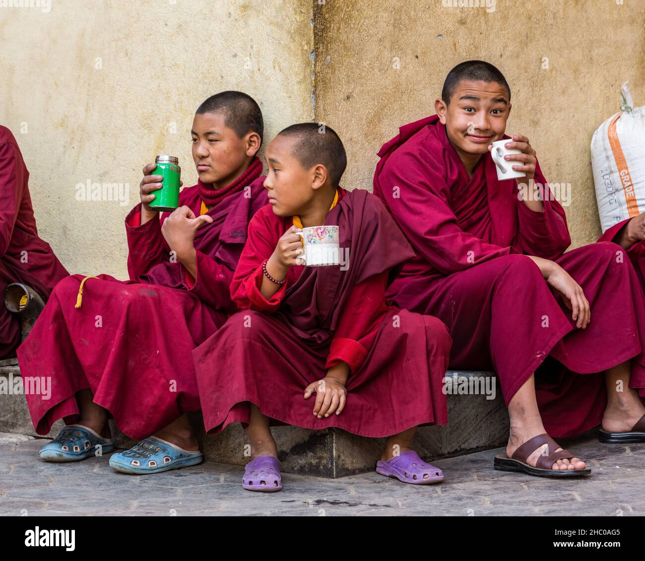 Monks performing tea ritual at dawn